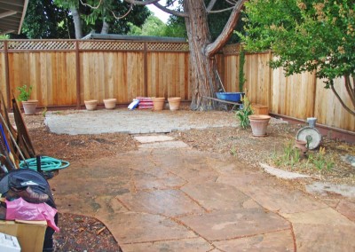 another view of flagstone patio in backyard
